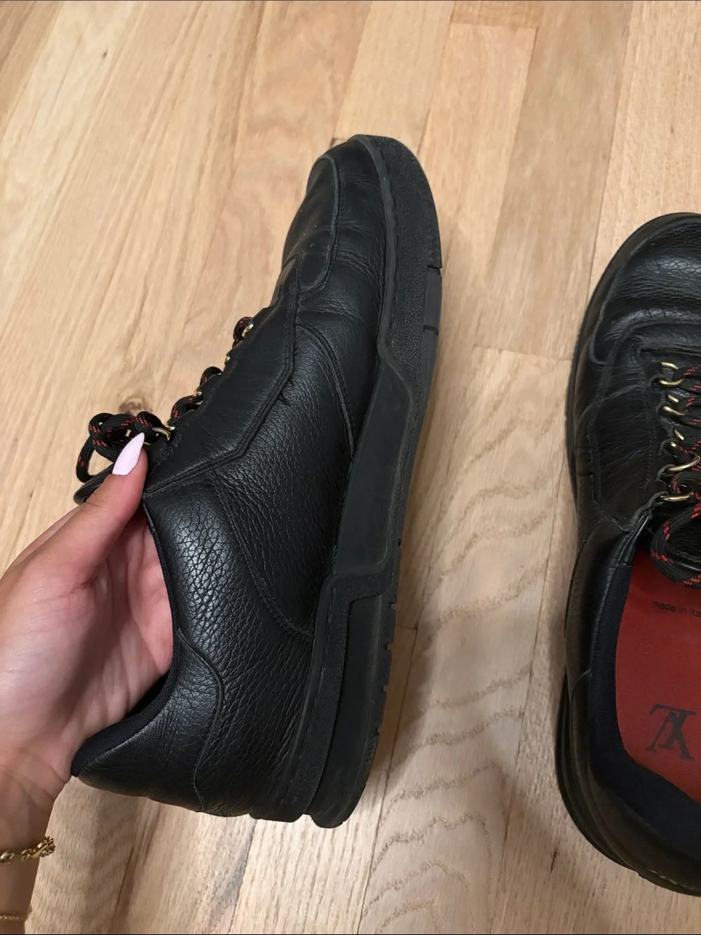 Louis Vuitton Black Leather Men's Sneakers with Red Insoles and Gold Accents